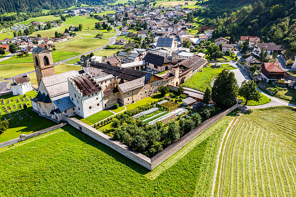 Aerial of the Benedictine Convent of St. John in Mustair, UNESCO World Heritage Site, Swiss Alps, Switzerland, Europe