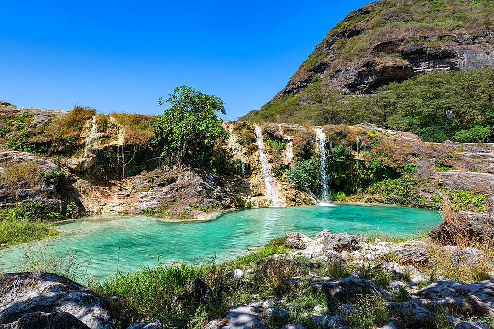 Turquoise waterfalls, Wadi Darbat, Salalah, Oman, Middle East