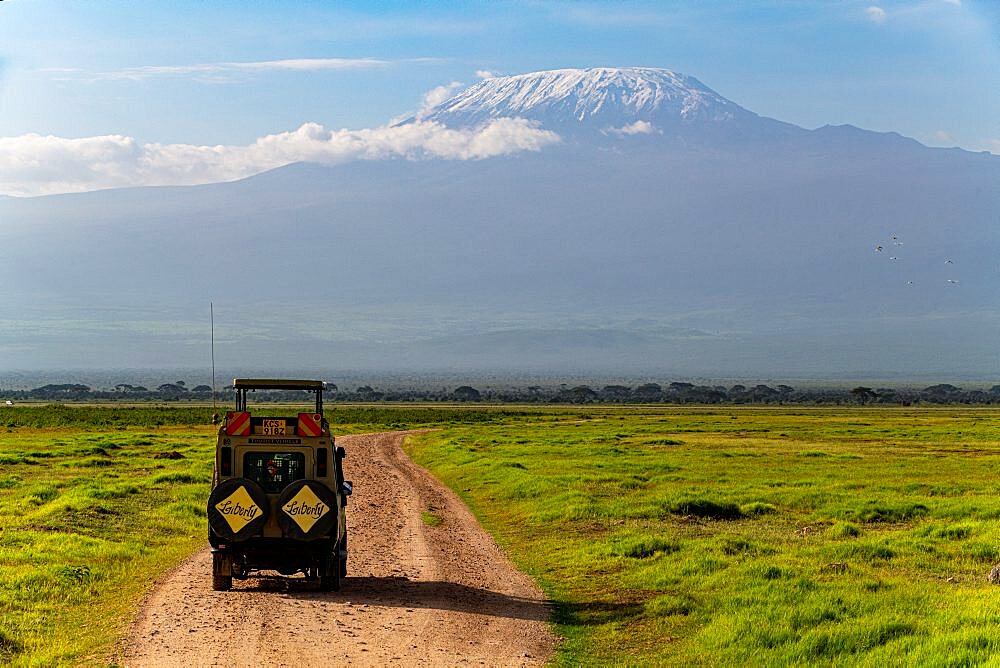 Jeep before Mount Kilimanjaro, Amboseli National Park, Kenya