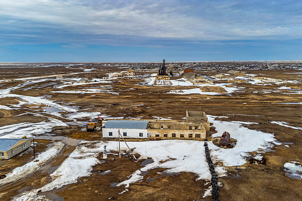 Aerial of an old wheat farm in the semi frozen earth, South of Kostanay, northern Kazakhstan, Central Asia, Asia