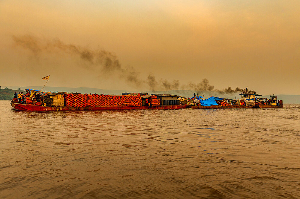 Overloaded riverboat on the Congo River at sunset, Democratic Republic of the Congo, Africa