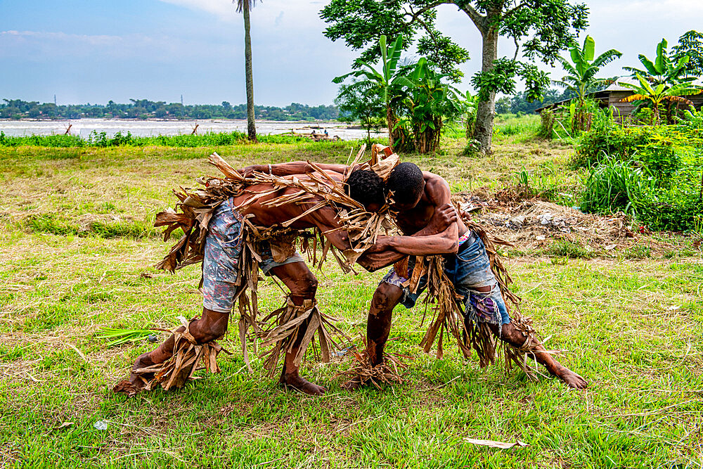 Wagenya tribal men practising wrestling, Kisangani, Congo River, Democratic Republic of the Congo, Africa