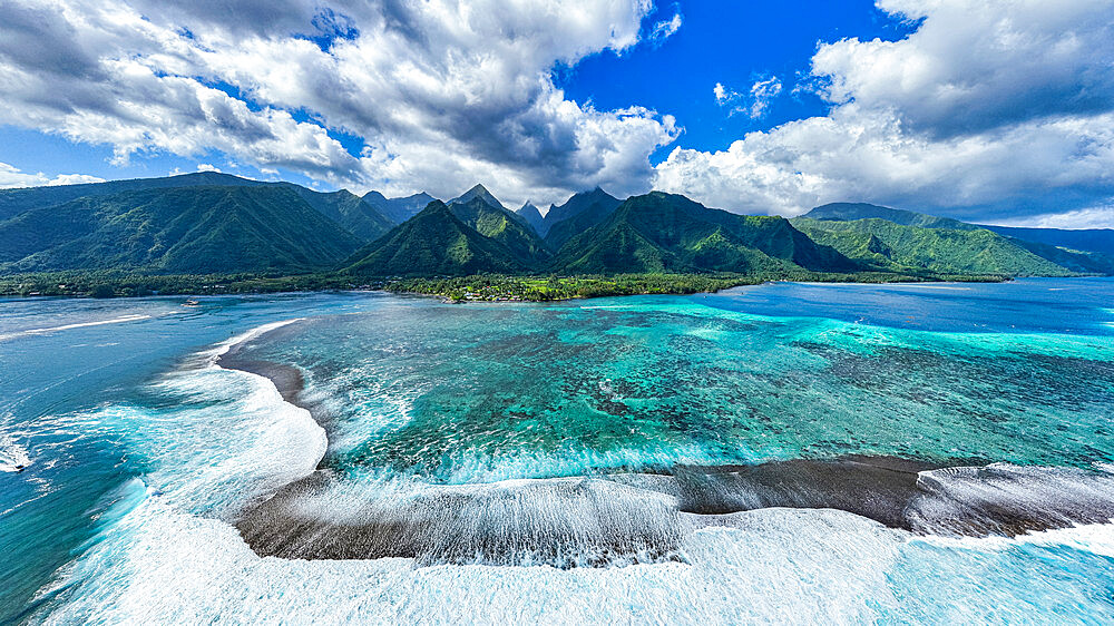 Aerial of Teahupoo wave and Tahiti Iti, Society Islands, French Polynesia, South Pacific, Pacific