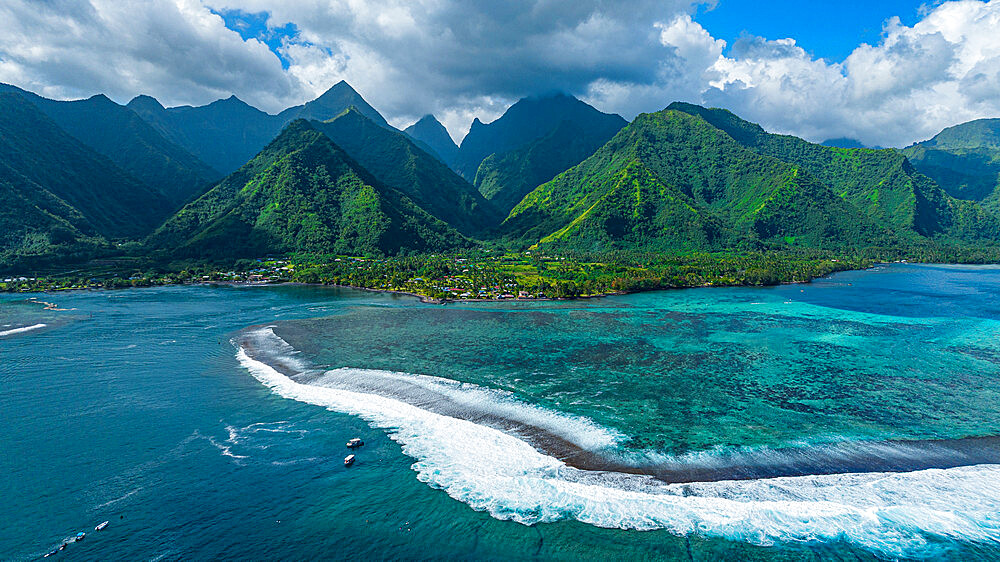 Aerial of Teahupoo wave and Tahiti Iti, Society Islands, French Polynesia, South Pacific, Pacific