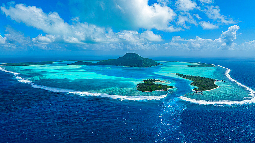 Aerial of the lagoon of Maupiti, Society Islands, French Polynesia, South Pacific, Pacific