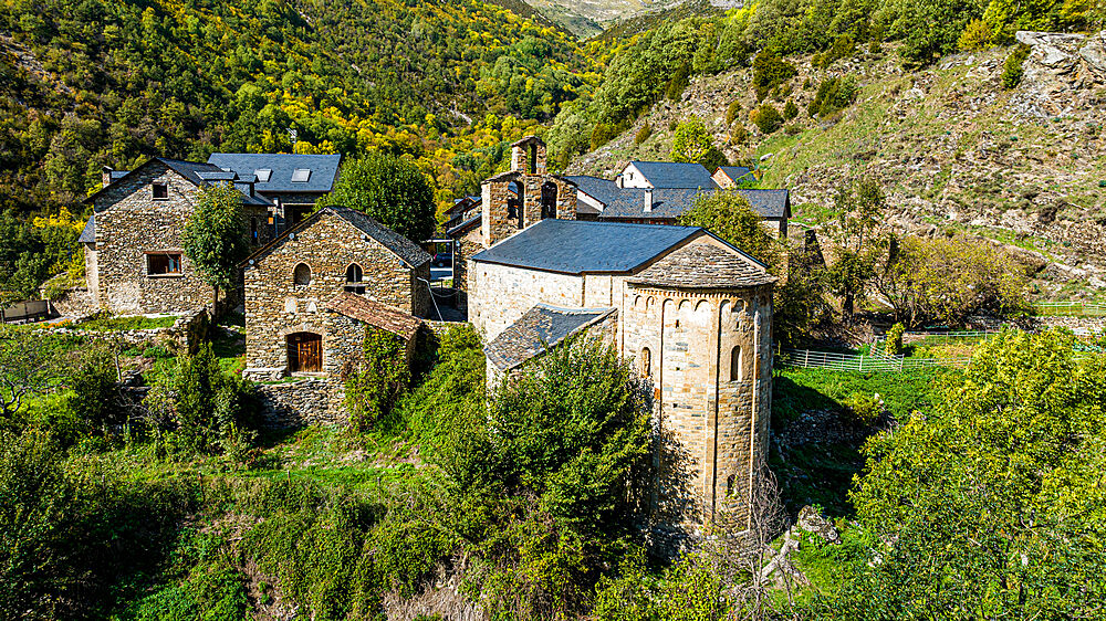 Aerial of the Romanesque church of Santa Maria de Cardet, UNESCO World Heritage Site, Vall de Boi, Catalonia, Spain, Europe