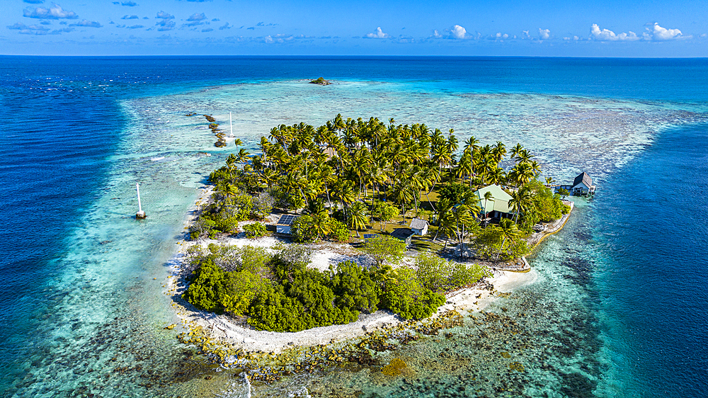 Aerial of a little island at the Avatoru Pass, Rangiroa atoll, Tuamotus, French Polynesia, South Pacific, Pacific