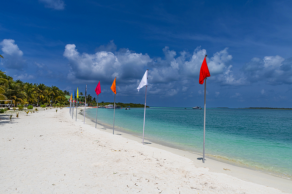 White sand beach with many flags, Bangaram island, Lakshadweep archipelago, Union territory of India, Indian Ocean, Asia