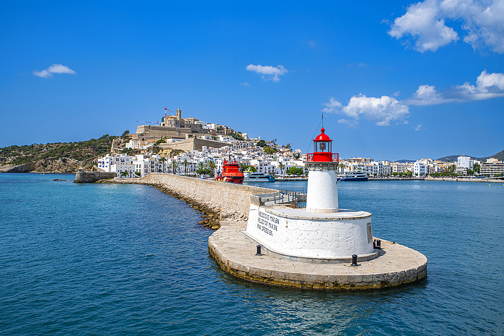 Harbour lighthouse and the old town of Ibiza with its castle seen from the harbor, UNESCO World Heritage Site, Ibiza, Balearic Islands, Spain, Mediterranean, Europe