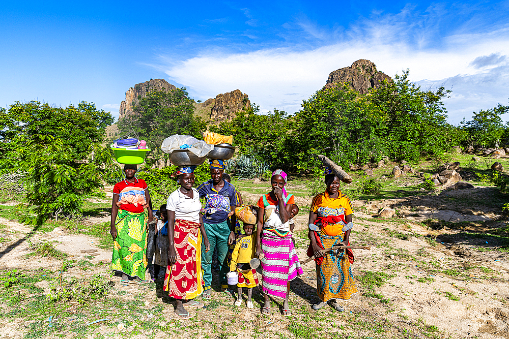 Kapsiki women coming back from the fields, Rhumsiki, Mandara mountains, Far North province, Cameroon, Africa