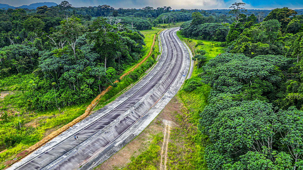 Empty highway in the jungle, future capital Ciudad de la Paz, Rio Muni, Equatorial Guinea, Africa