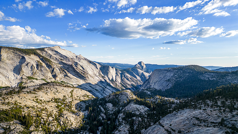 Granite mountains with Half Dome in the background, Yosemite National Park, UNESCO World Heritage Site, California, United States of America, North America