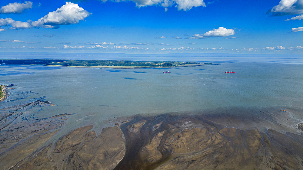 Aerial of the Gouffre River flowing in the St. Lawrence River, Quebec, Canada, North America