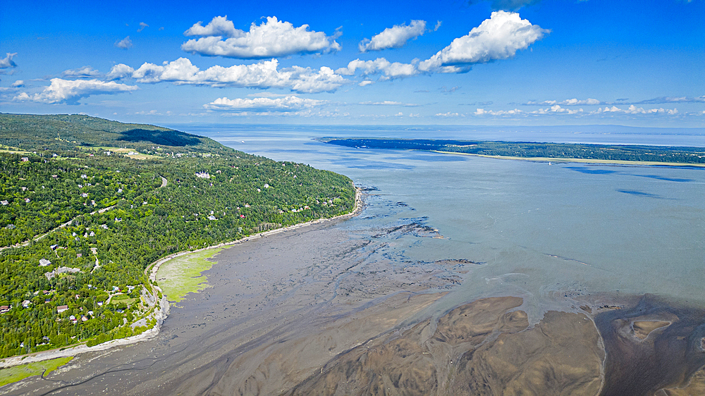 Aerial of the Gouffre River flowing in the St. Lawrence River, Quebec, Canada, North America