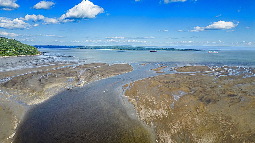 Aerial of the Gouffre River flowing in the St. Lawrence River, Quebec, Canada, North America