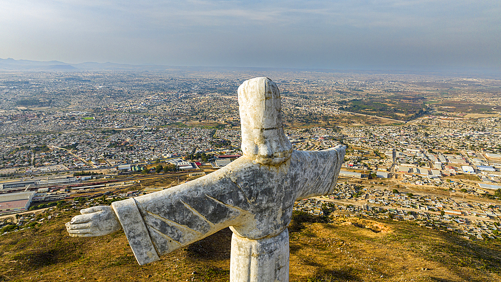 Aerial of the Christ the King Statue, overlooking Lubango, Angola, Africa