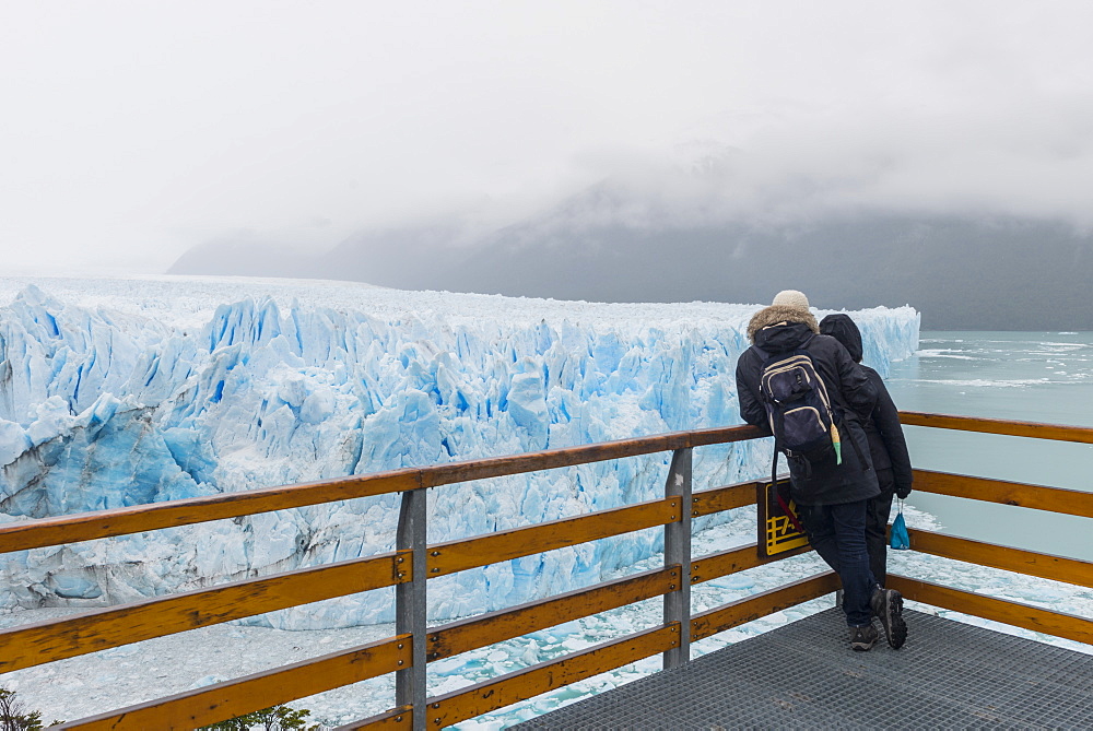 People at the Perito Moreno glacier viewing point, El Calafate, Santa Cruz, Argentina, South America