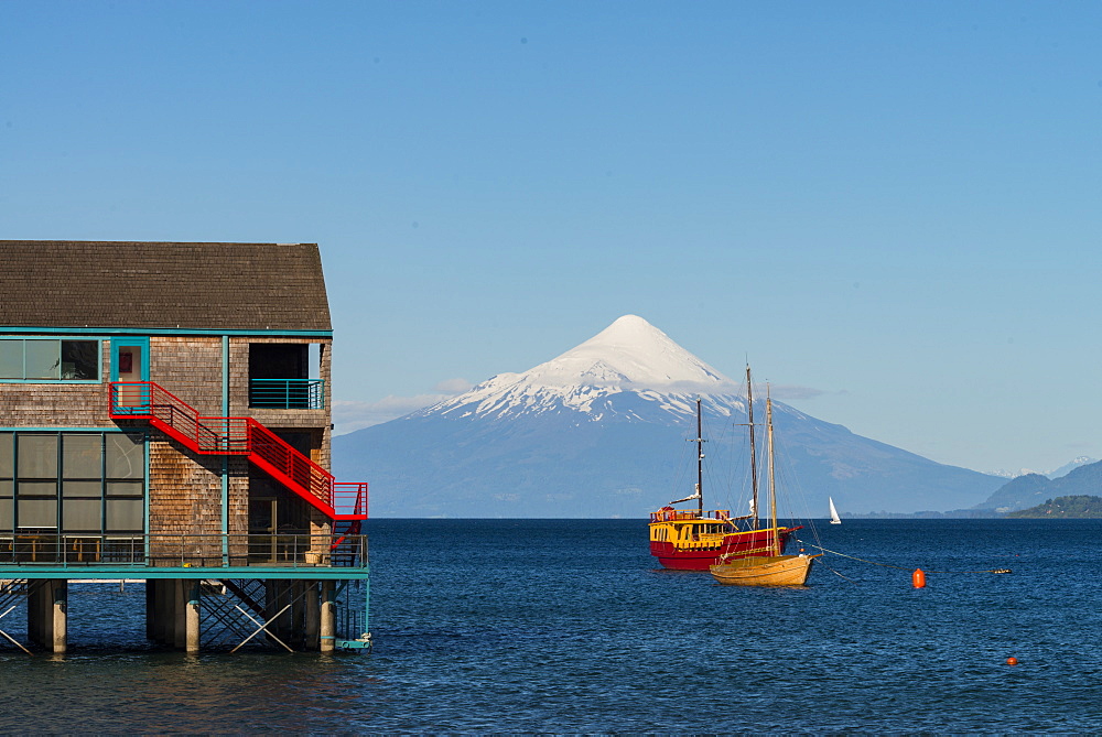 Boat and boat house in lake Llanquihue and Volcan Osorno, Puerto Varas, Chilean Lake District, Los Lagos, Chile, South America