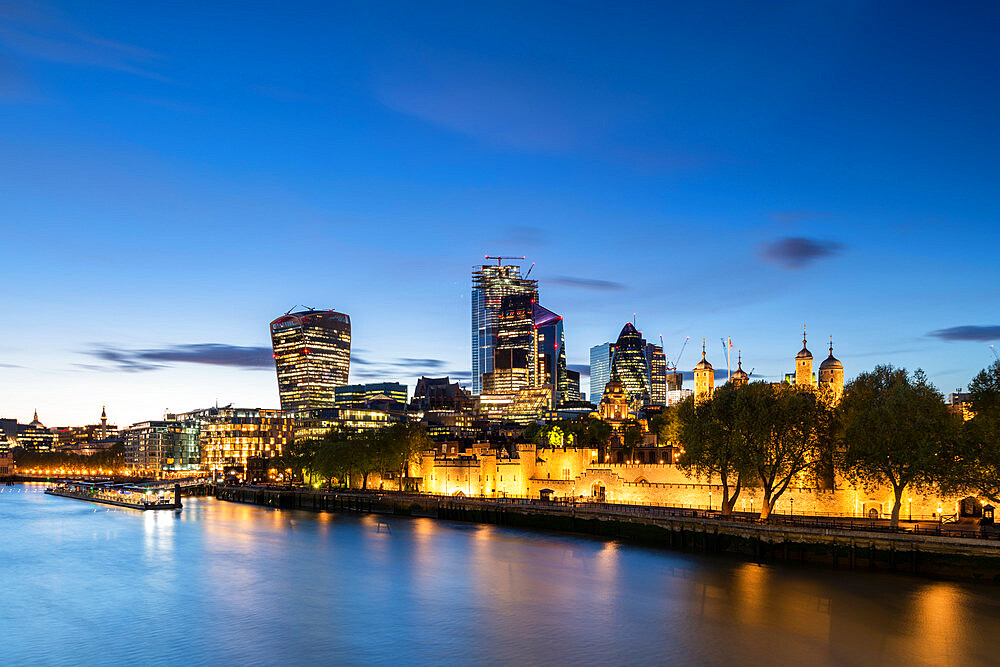 The City of London and The Tower of London at dusk and the River Thames, London, England, United Kingdom, Europe