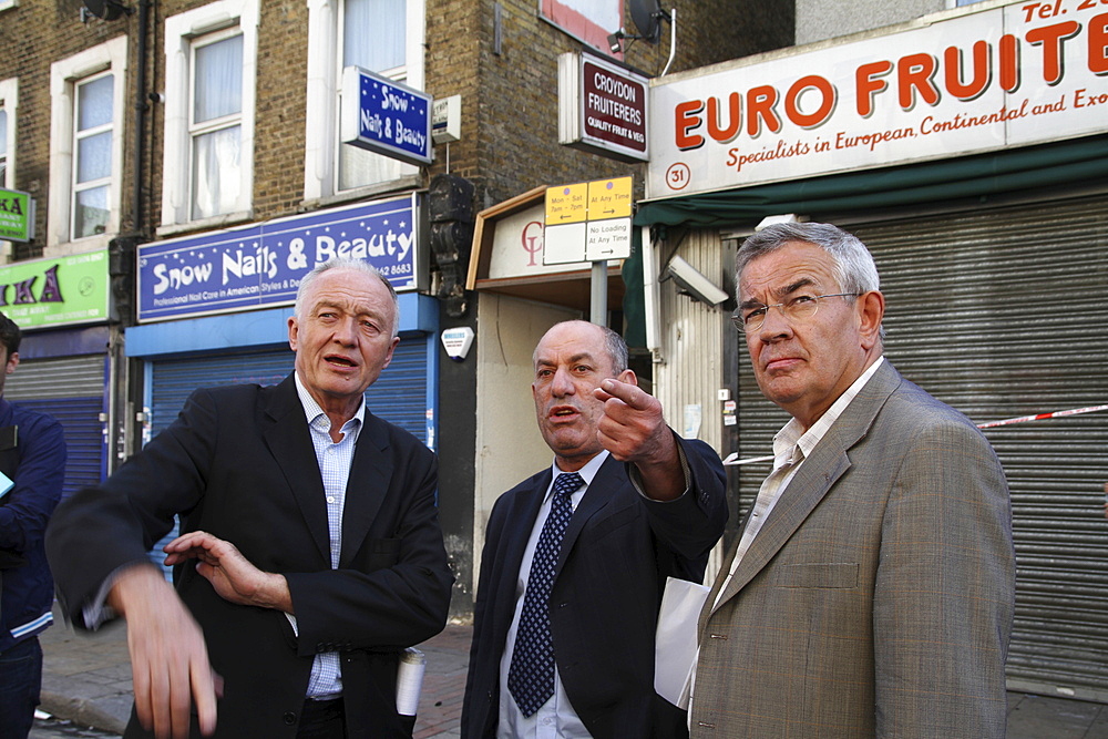 Labour party candidate for mayor of london ken livingston inspects damage to property after rioting and looting in croydon, london, uk