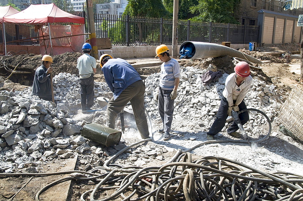 China migrant workers from the countryside working in construction in kunming, yunnan province