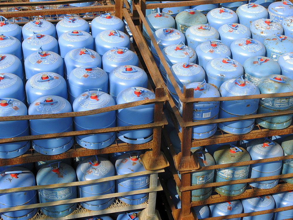 Uk. Calor gas bottles in a depot in tower hamlets, london, england.