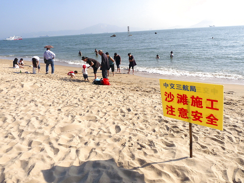 China chinese tourists on a beach in gulangyu island near xiamen in fujian province