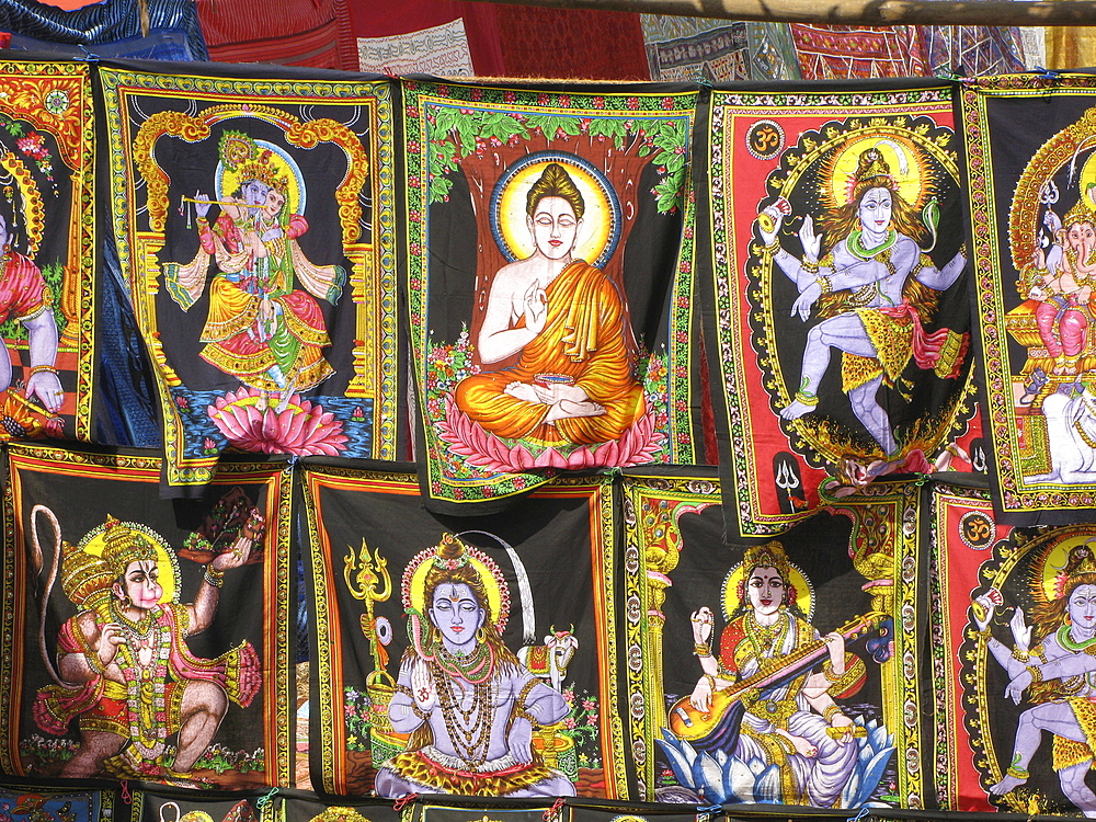 India. Garments with hindu deities sale in a mumbai bazaar