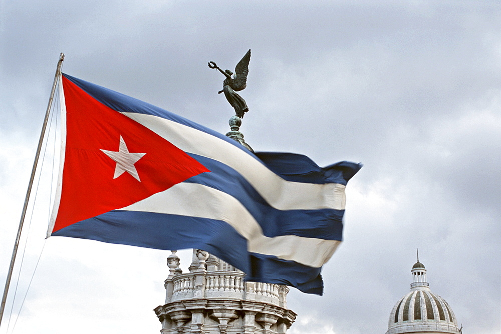 Cuba the cuban flag by the parliament building in havana