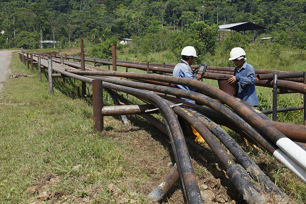 Oil extraction and pollution in the Amazon, Huaorani Amerindians trying to survive through eco-tourism against the threat of oil multinationals, Yasuni National Park, Amazon, Ecuador, South America