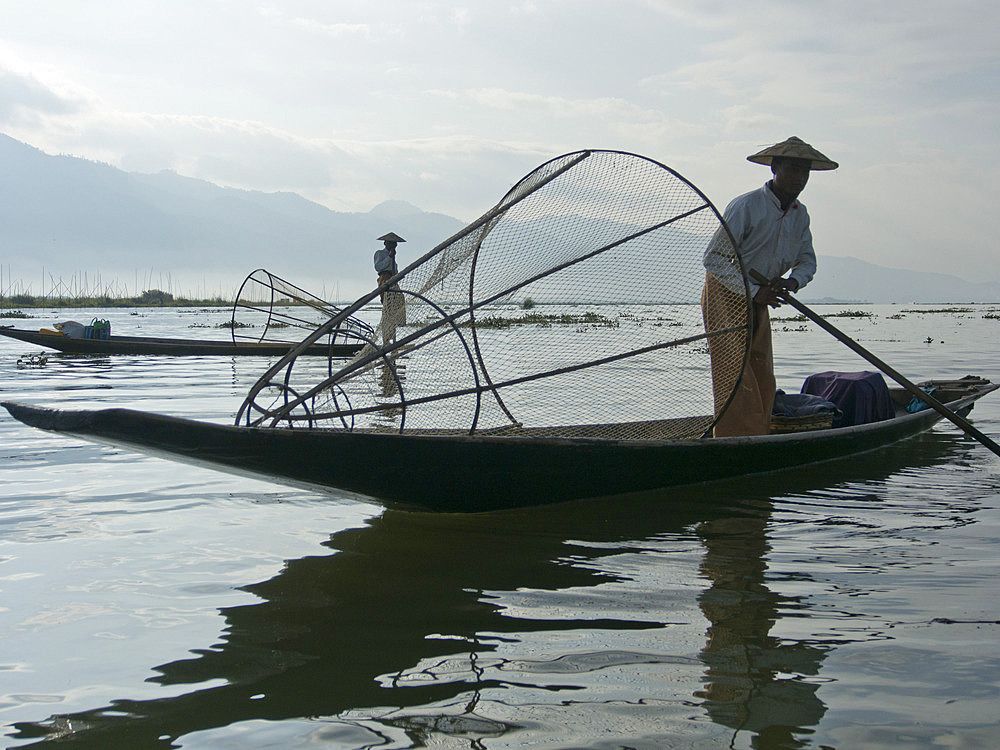 Fishermen cast their nets in Inle Lake, Shan State, Myanmar (Burma), Asia