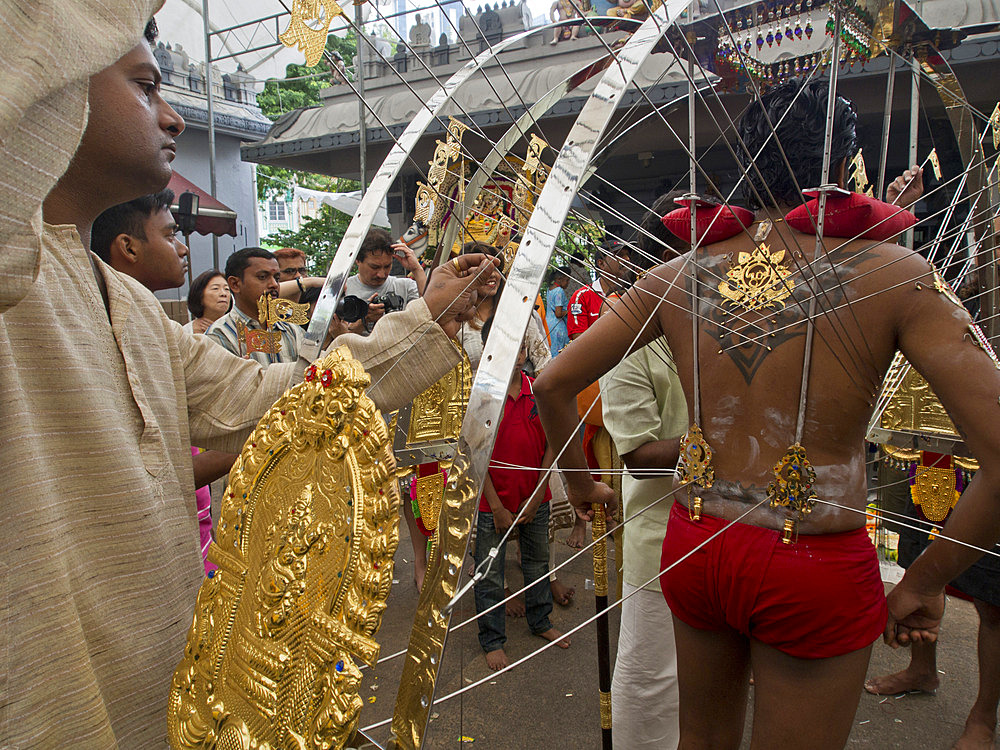 Devotee with body piercings, Thaipusam Hindu Tamil festival celebrated in Little India, Singapore, Southeast Asia, Asia