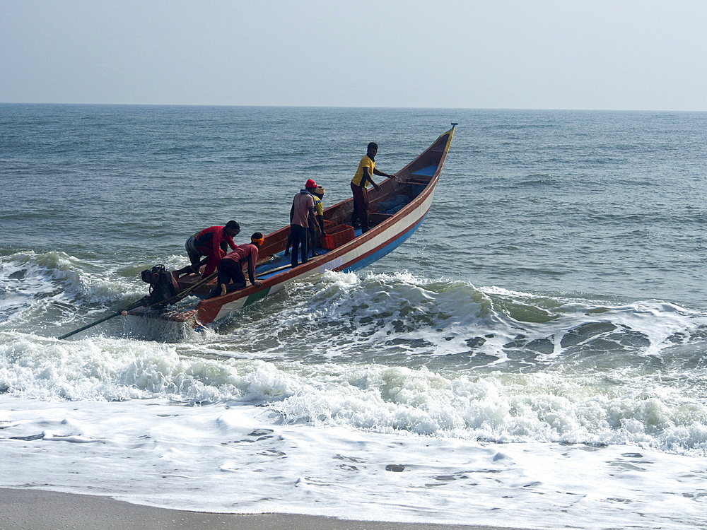 Fishermen on a boat at the French union territory of Pondicherry, Tamil Nadu, India, Asia