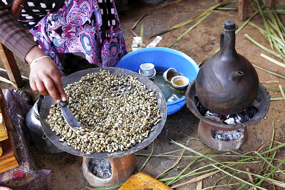 Woman roasting coffee in the Jimma region in Ethiopia, Africa