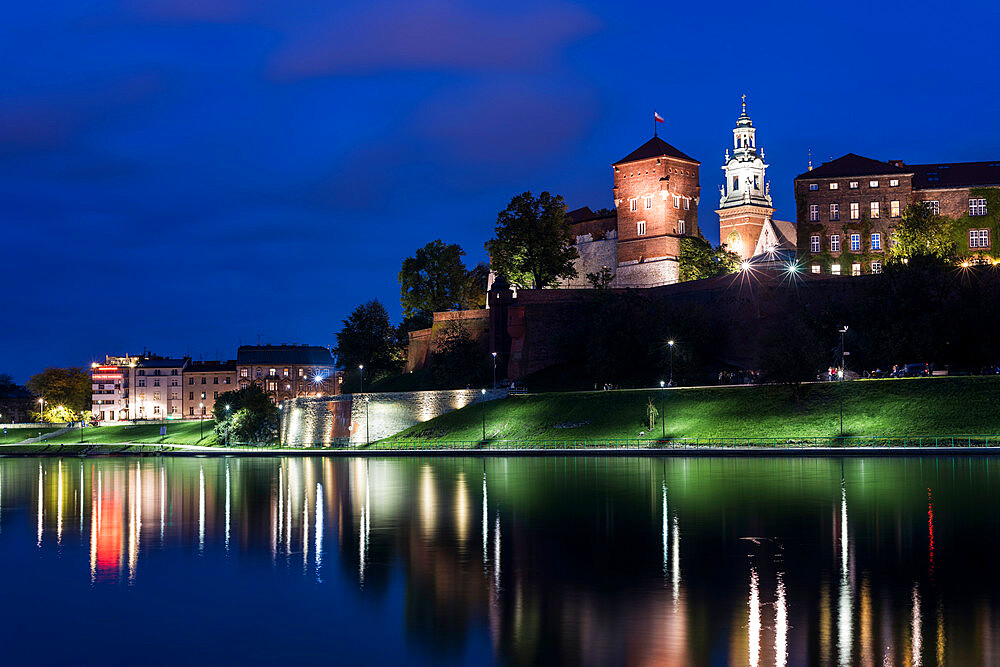 Wawel Castle, UNESCO World Heritage Site, across Vistula River, at night, Krakow, Poland, Europe