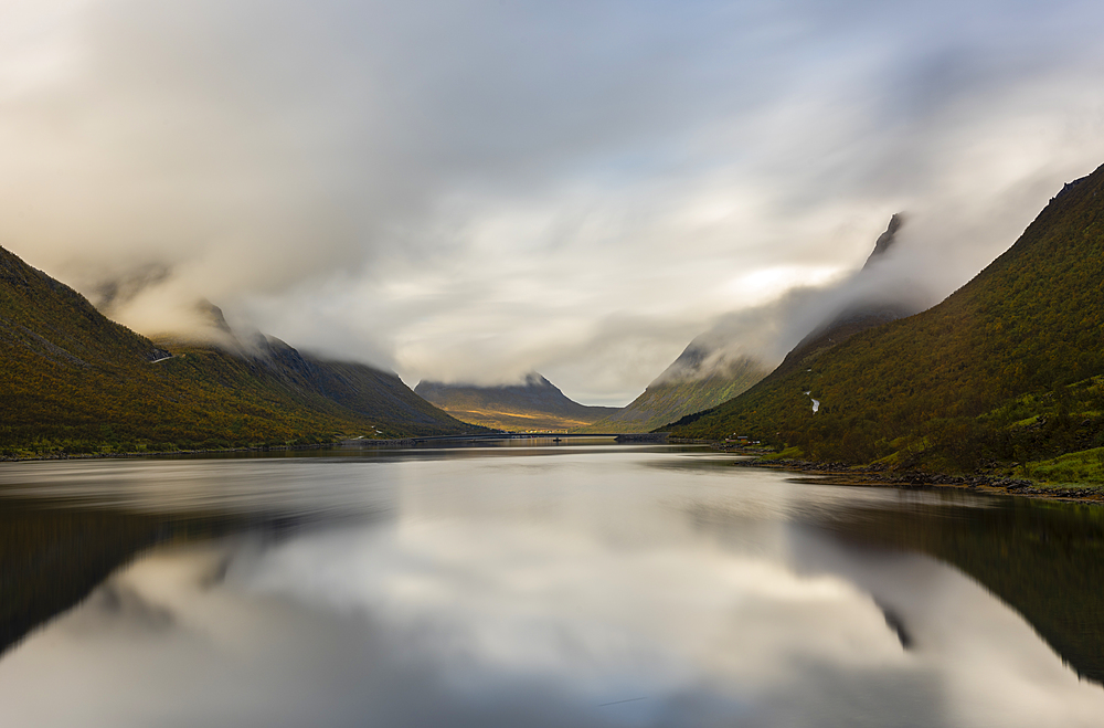 Mountains, reflection and bridge crossing, Gryllefjordbotn, Senja, Norway, Europe