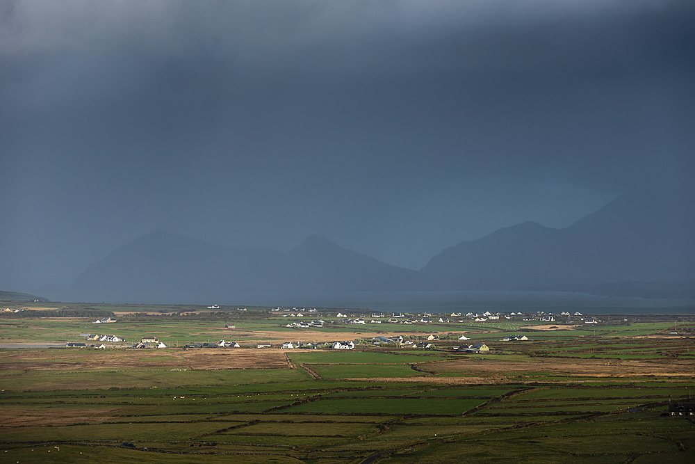 Traditional houses, fields and mountains, looking north from Waymont, Dingle Peninsula, County Kerry, Munster, Republic of Ireland, Europe