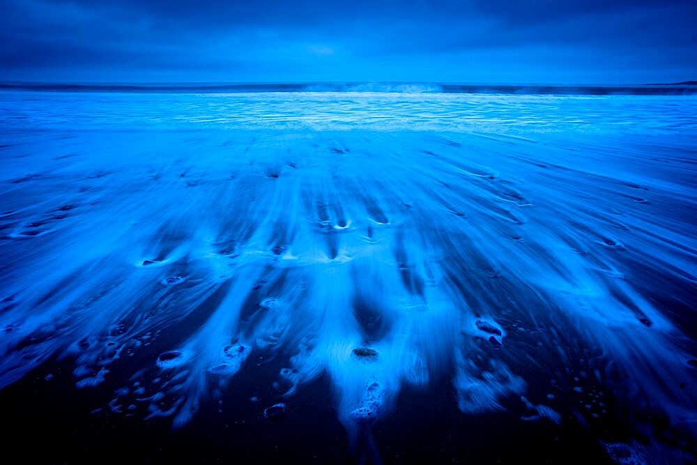 Receding tide at dawn, Oxwich Bay, Gower Peninsula, Swansea, Wales, United Kingdom, Europe