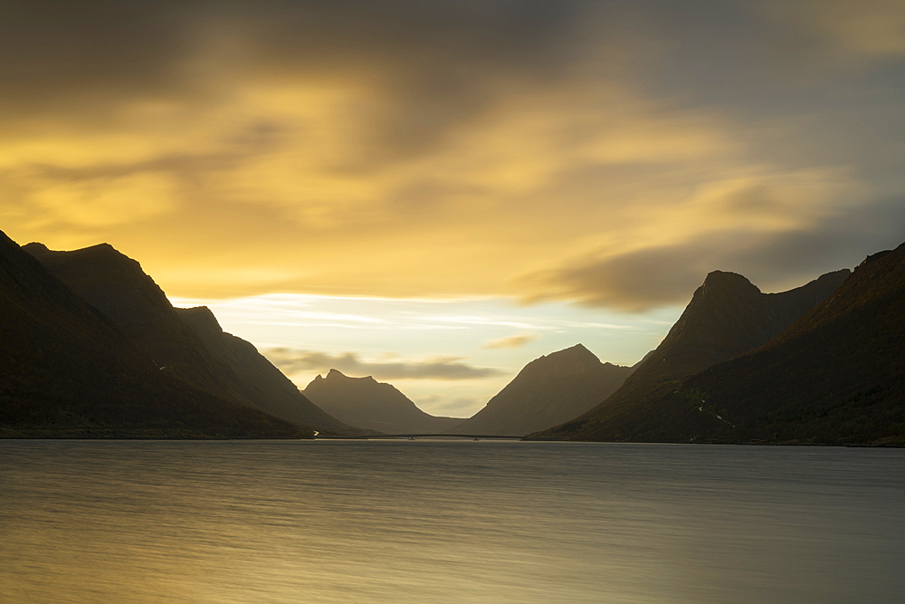 Sunset across Gryllefjordbotn, Senja, Troms og Finnmark, Norway, Scandinavia, Europe