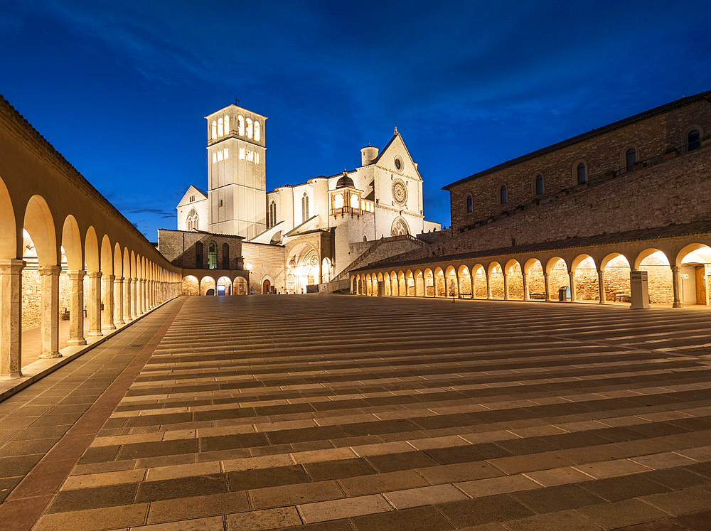 Lower Square of St. Francis and the Basilica of Saint Francis of Assisi, illuminated at night, UNESCO World Heritage Site, Assisi, Perugia, Umbria, Italy, Europe