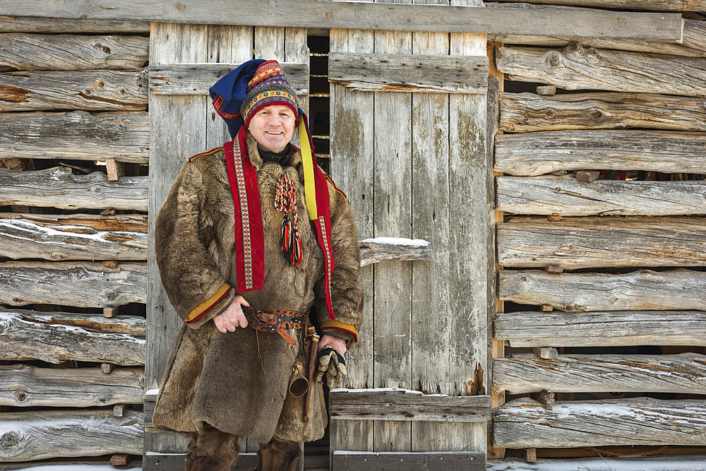 Sami man in traditional dress, Finland, Europe