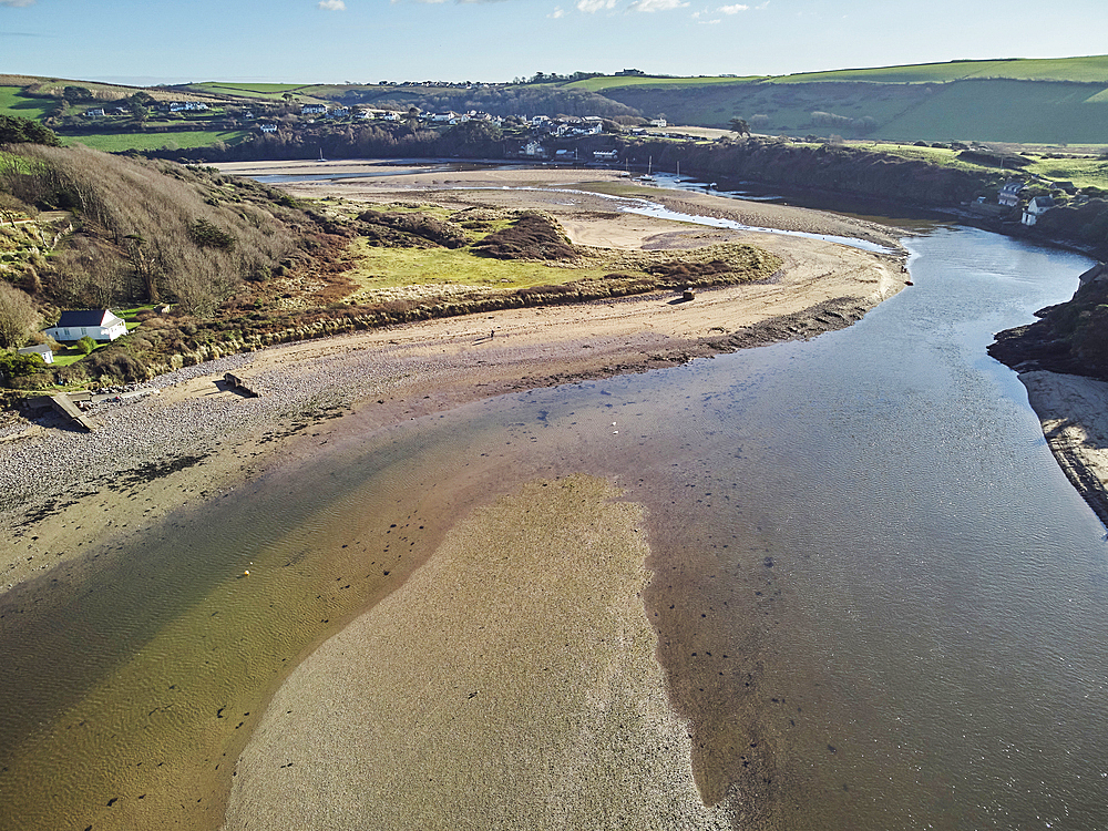 A low tide aerial drone view of the sandy shore and sand banks in the estuary of the River Avon, at Bantham, on the south coast of Devon, Great Britain.