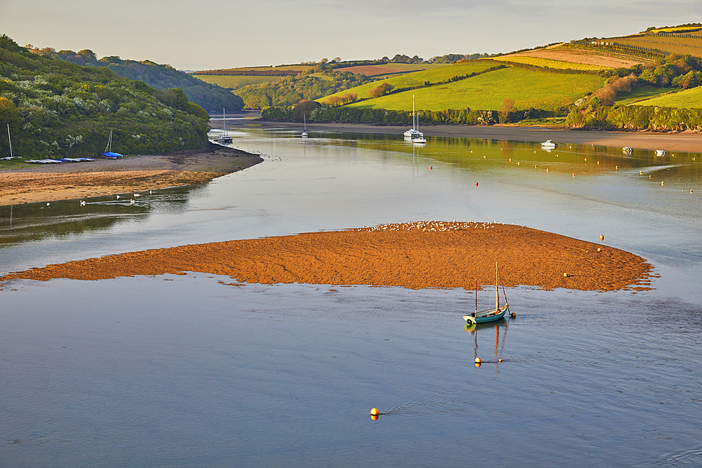 An evening sunlight view of the estuary of the River Avon, at Bantham, on the south coast of Devon, Great Britain.