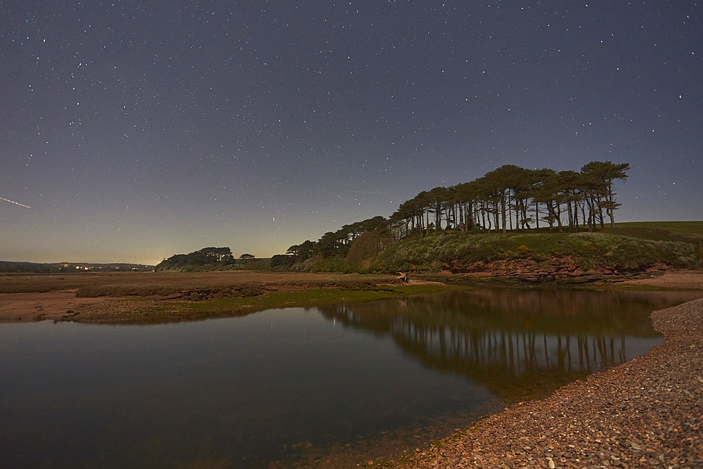 The night sky over the estuary of the River Otter, at Budleigh Salterton, on the Devon coast, Great Britain.