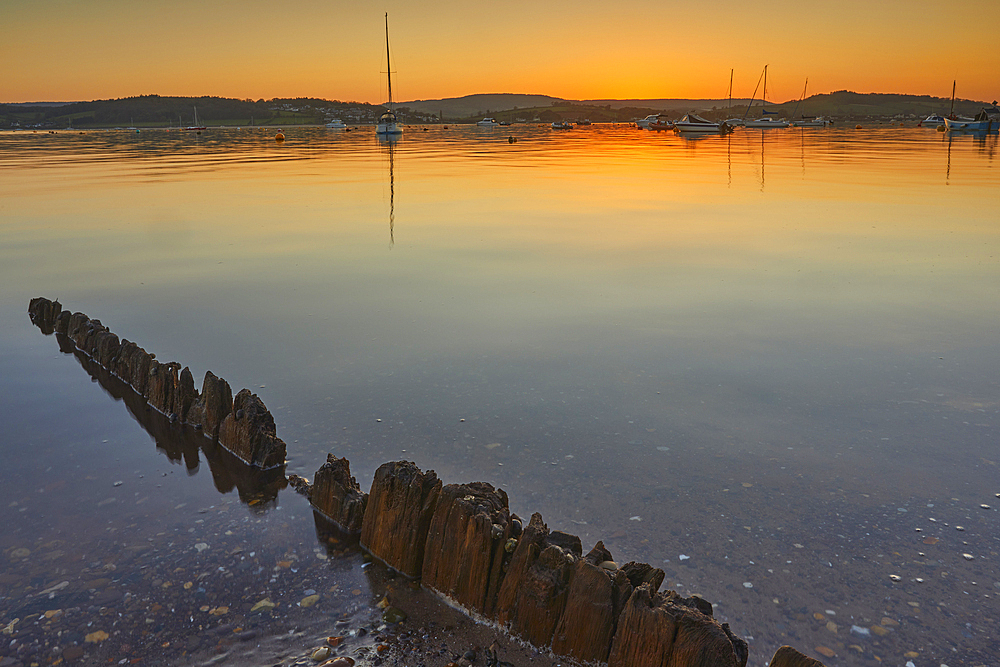 A calm dusk over the estuary of the River Exe, at Exmouth, on the coast of Devon, Great Britain.