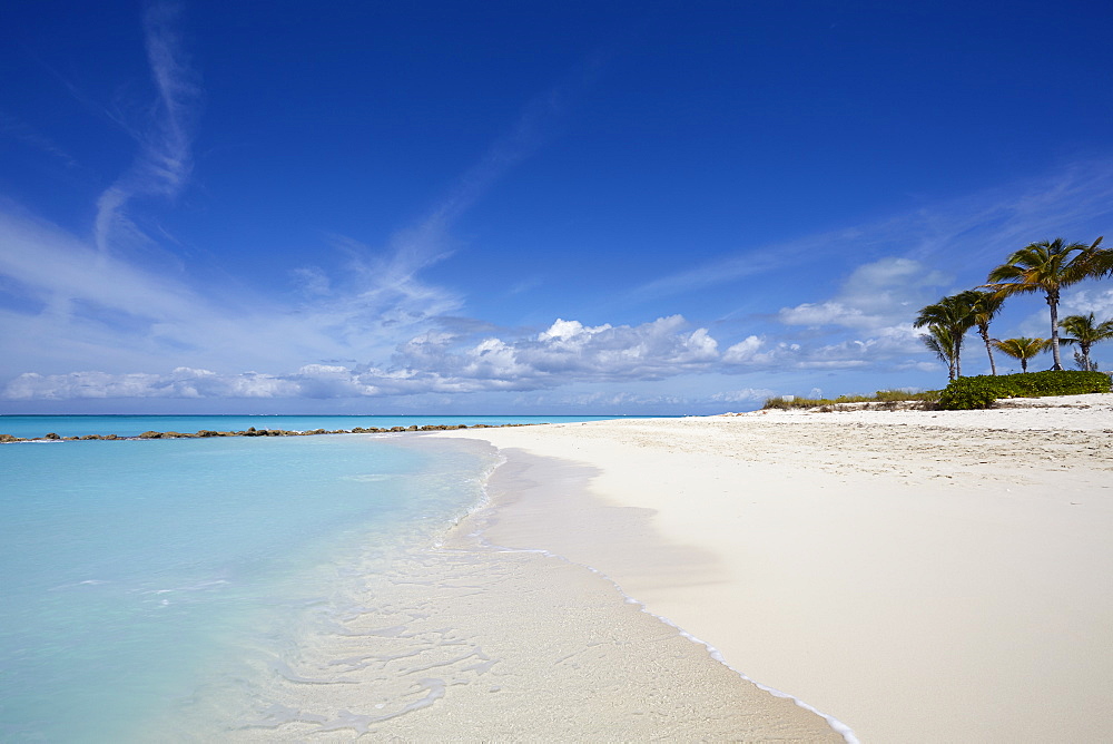 The sands of Grace Bay, the most spectacular beach on Providenciales, Turks and Caicos, in the Caribbean, West Indies, Central America