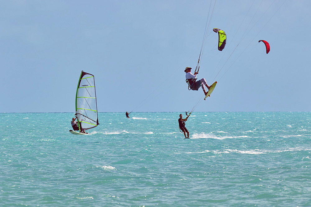 Kite-surfing and windsurfing at Long Bay Beach, on the south coast of Providenciales, Turks and Caicos, in the Caribbean, West Indies, Central America