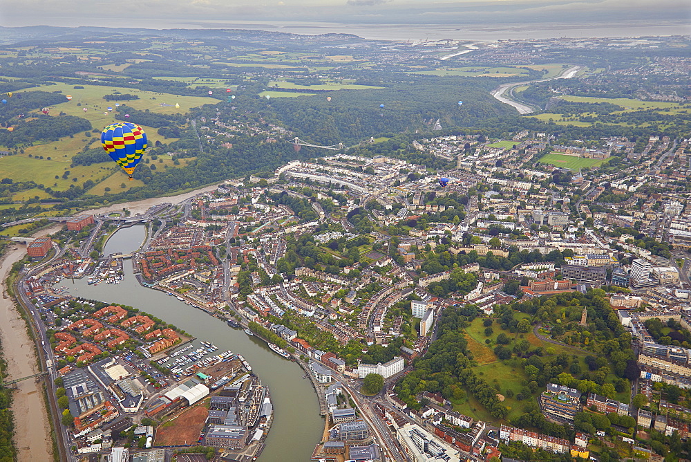 A hot-air balloon flying over the city of Bristol during the Bristol International Balloon Fiesta, Bristol, England, United Kingdom, Europe