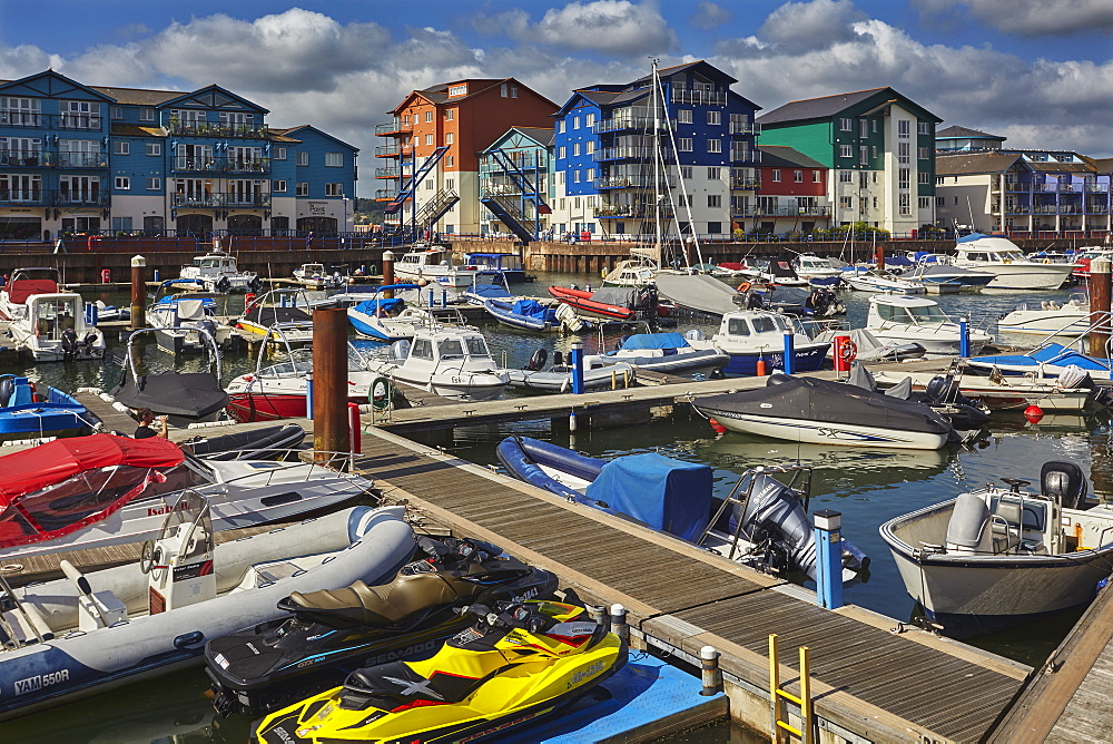 A dusk view of the marina and modern apartments in the revamped dock at Exmouth, on the south coast of Devon, England, United Kingdom, Europe