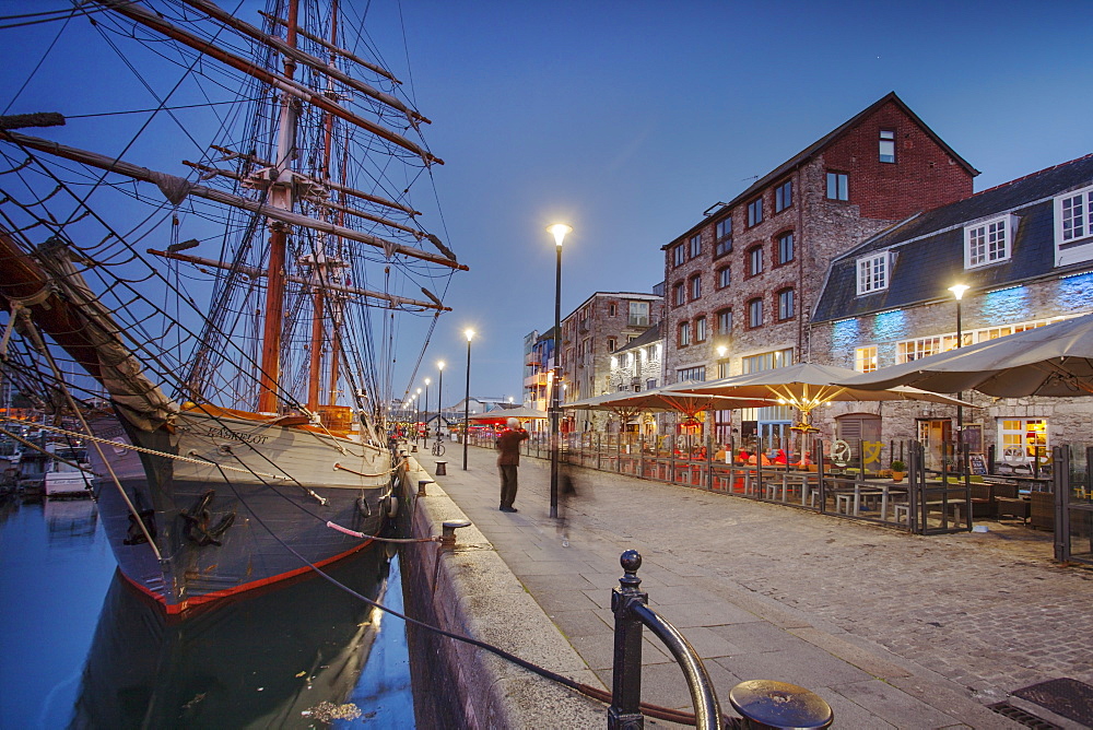 An atmospheric dusk at Sutton Harbour and the Barbican, the historic and tourism heart of the city of Plymouth, Devon, England, United Kingdom, Europe